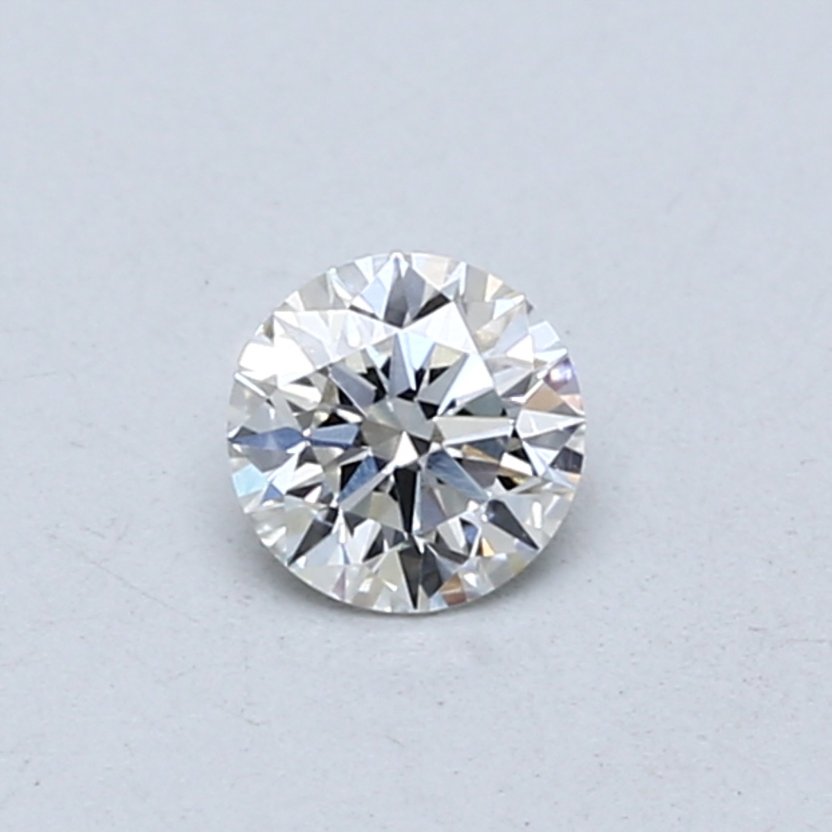 Actual 0.34 carat G Round lab-grown diamond